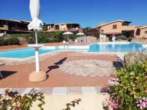 Snug holiday home in Marinella with shared pool, Marinella
